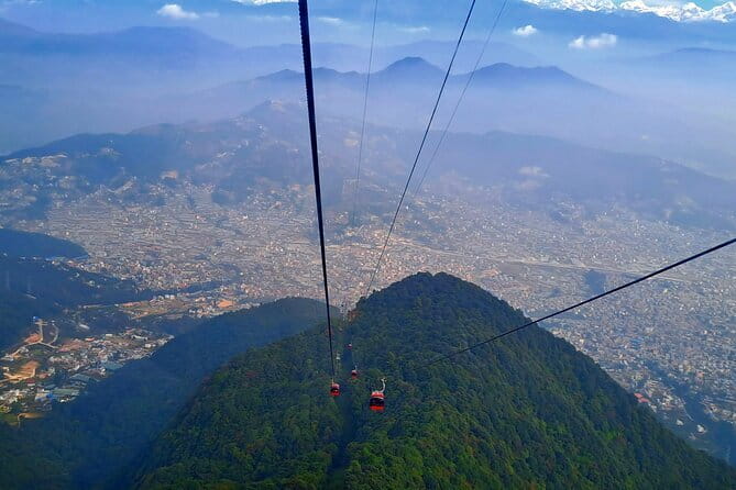 Kathmandu Chandragiri Cable Car and Swayambhunath Private Tour - Sunset over Kathmandu after a full day