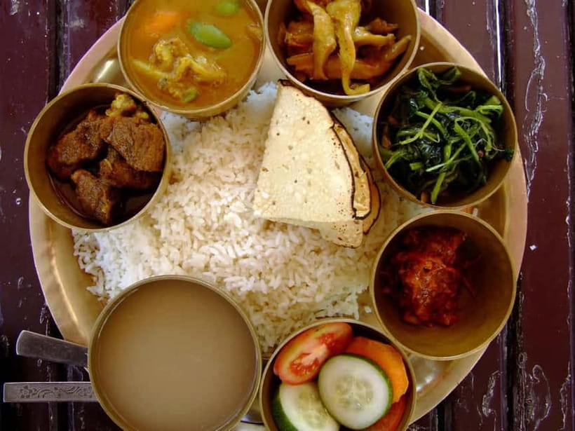 Kathmandu: Dining Experience at Local's Home & Cooking Demo - The opening welcome with raksi and tea