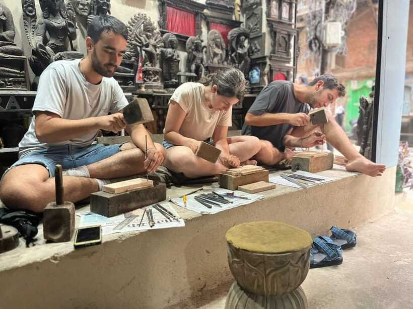 Kathmandu: Wood Carving Workshop with Local Artisan (Thamel) - Adding detail to create a finished souvenir