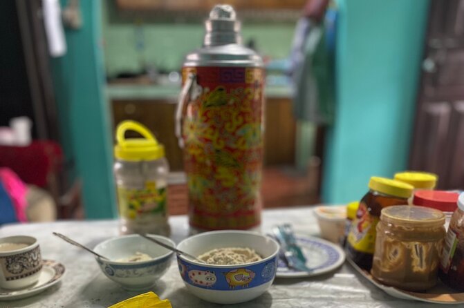 Morning Tibetan cultural tour to Tibetan settlements Pokhara - Prayer wheels and symbols at Shree Gaden Dhargay Ling
