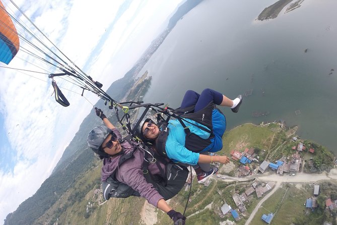 Paragliding at Sarangkot Pokhara - Preparing for takeoff with your pilot
