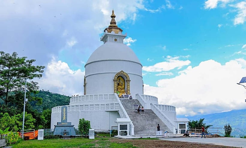 Pokhara: City Sightseeing Group Budget Bus Tour - Pumdikot Shiva Statue starts the day on a high note