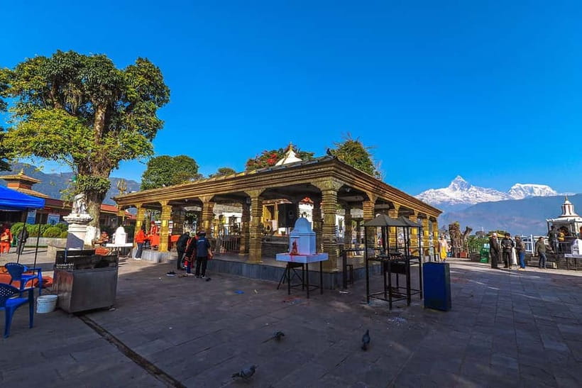 Pokhara: City Sightseeing Group Budget Bus Tour - Gupteshwor Mahadev Cave leads into a sacred underground world