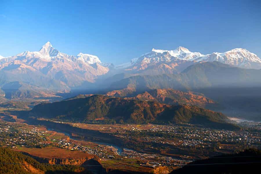 Pokhara: Sarangkot Sunrise & World Peace Pagoda Sunset Tour - The return to Pokhara, and the unclear sunset section