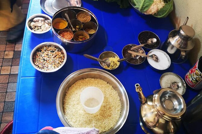 The best Private Nepali Cooking Class in Kathmandu - Grinding spices and preparing the meal